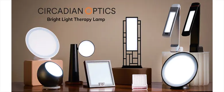 collection of circadian optics lumos light therapy lamps in various designs (round, rectangular, artistic) with visible text 'circadian optics' and 'bright light therapy lamp'
