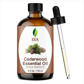 essential oil cedarwood bottle - sva branded amber glass bottle with dropper, pine cone imagery, and 4 fl oz label