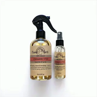 flower & earth cinnamon stick essential oil spray bottles (8oz and 2oz sizes); cinnamon oil spray mentioned on labels as natural home fragrance