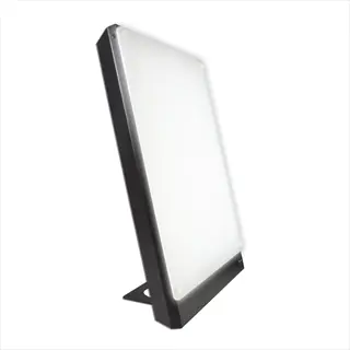northern light technologies boxelite light therapy box with bright, evenly lit white panel and black frame on a stand