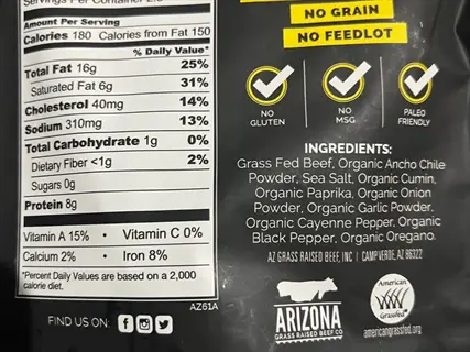 organic meat nutrition label showing grass-fed beef ingredients, dietary certifications (no grain/msg/paleo), and detailed nutritional facts