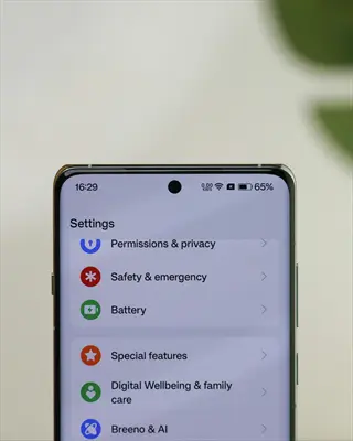 smartphone settings menu showing options like permissions, battery, and digital wellbeing on a mobile device screen
