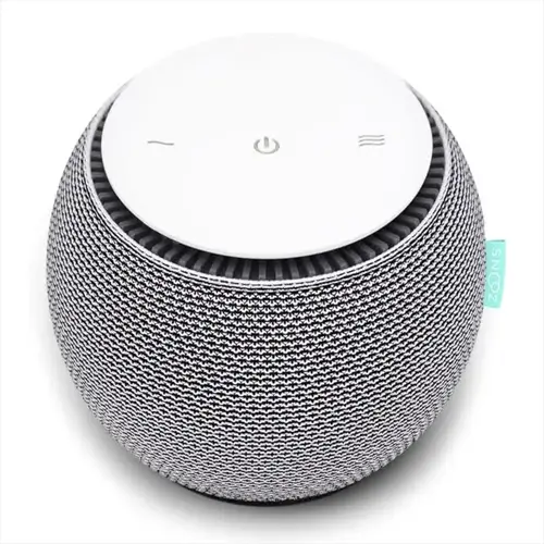 snooz white noise machine: circular device with fabric-woven exterior, white control panel (power/sound icons), and 'snooz' tag. designed for bedroom sleep environments