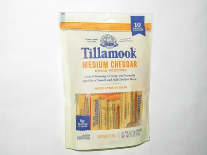 tillamook medium cheddar snack cheese portions package showing 10 pre-portioned cheese sticks for controlled serving size
